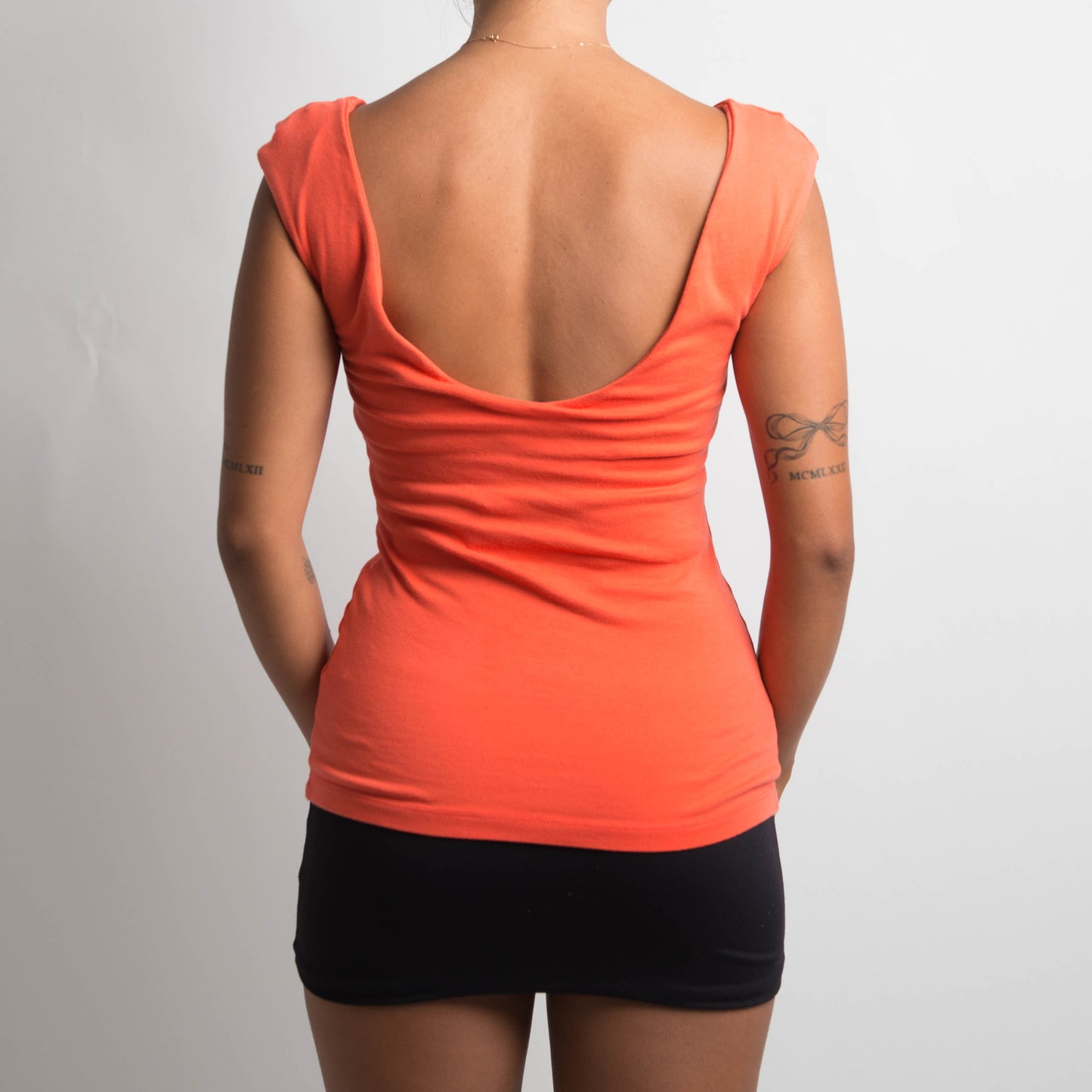 ORANGE SLEEVELESS TOP