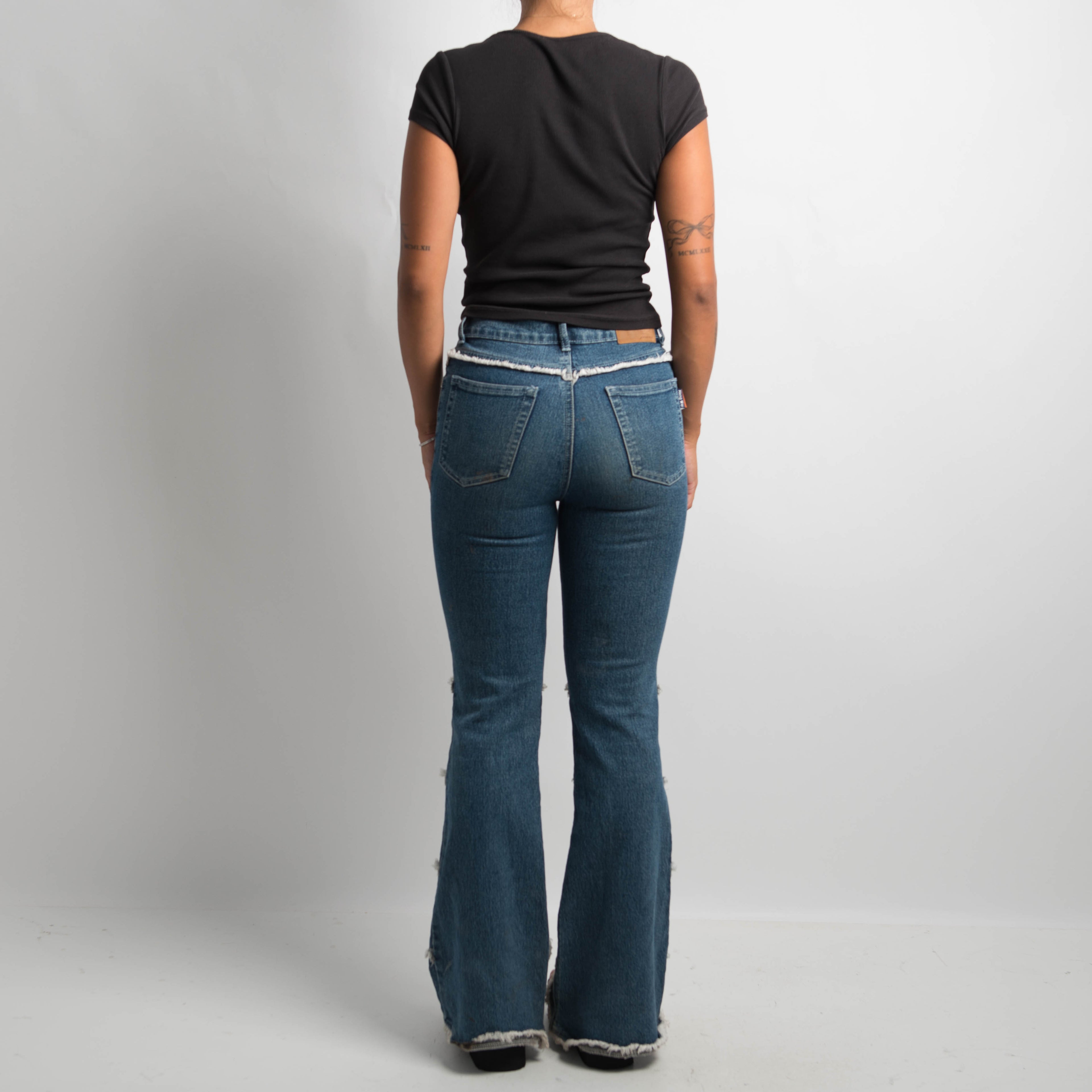 FRINGE DETAIL FLARED JEANS