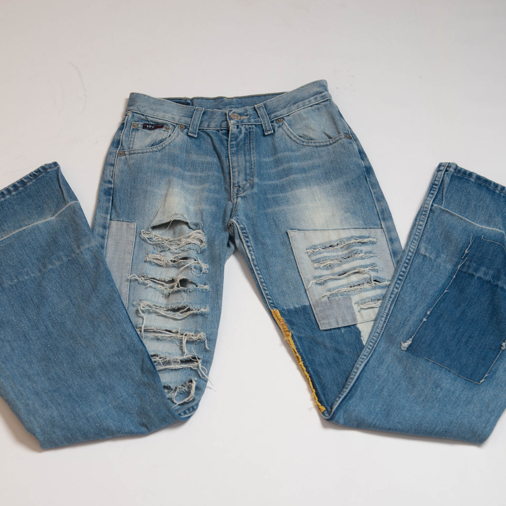 DISTRESSED PATCHWORK JEANS