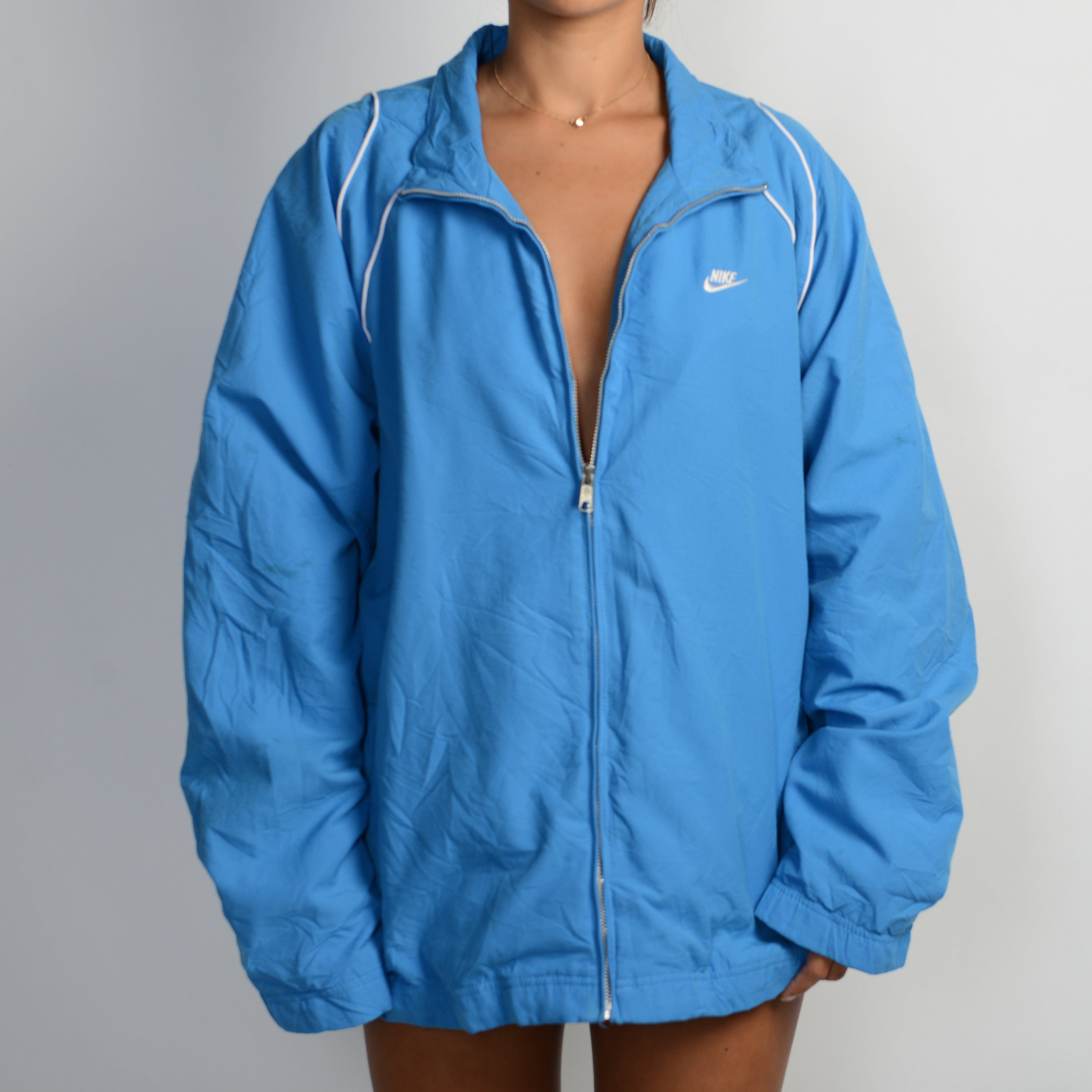 nike womens spray jacket