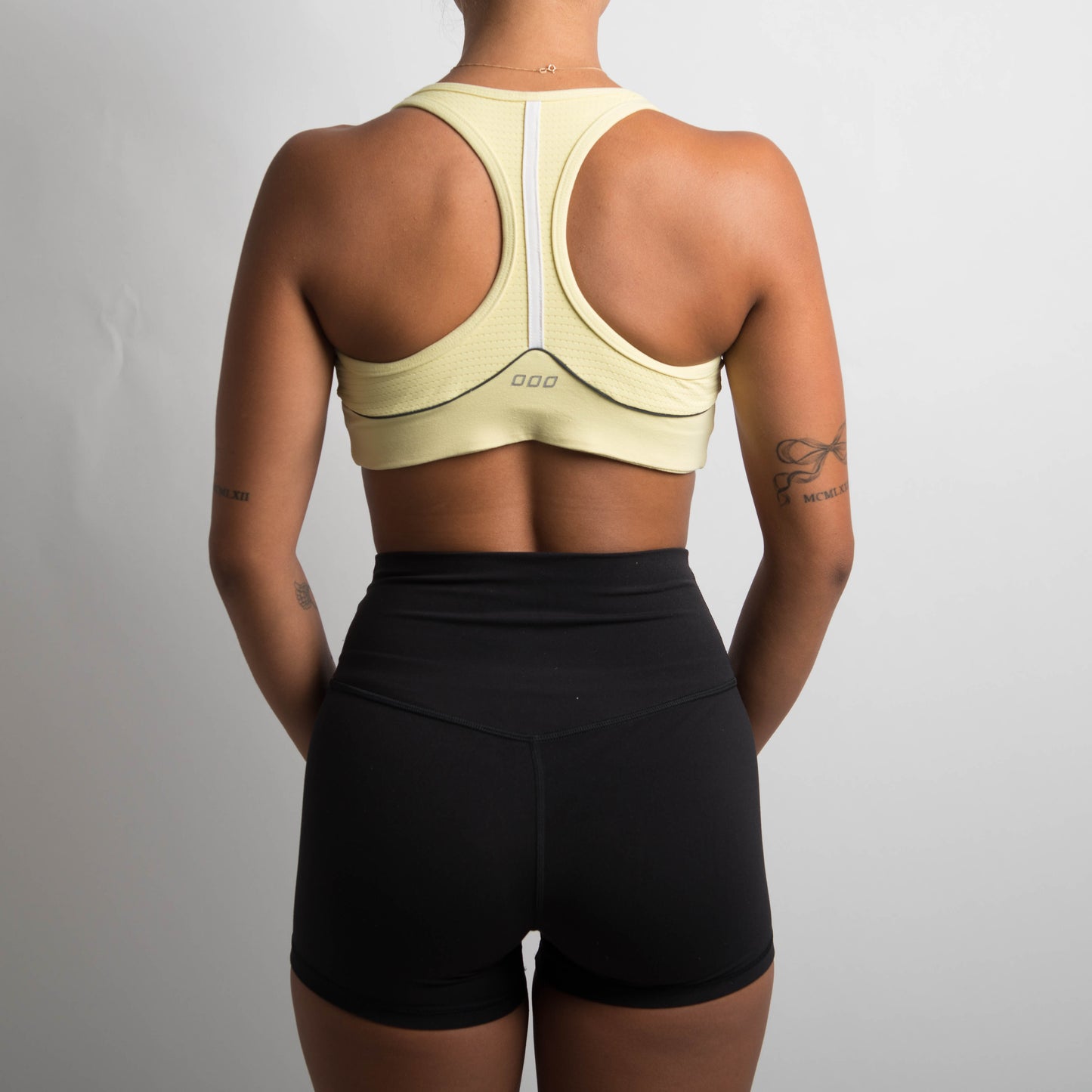 PALE YELLOW SPORTS BRA