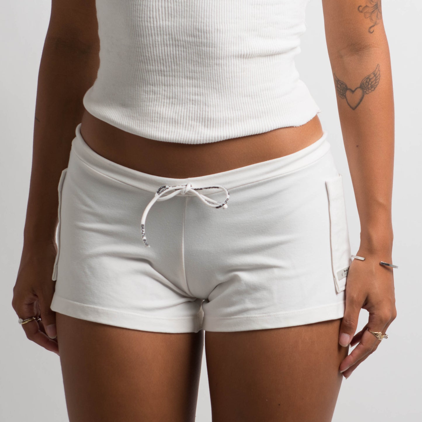 WHITE POCKET MINI SHORTS