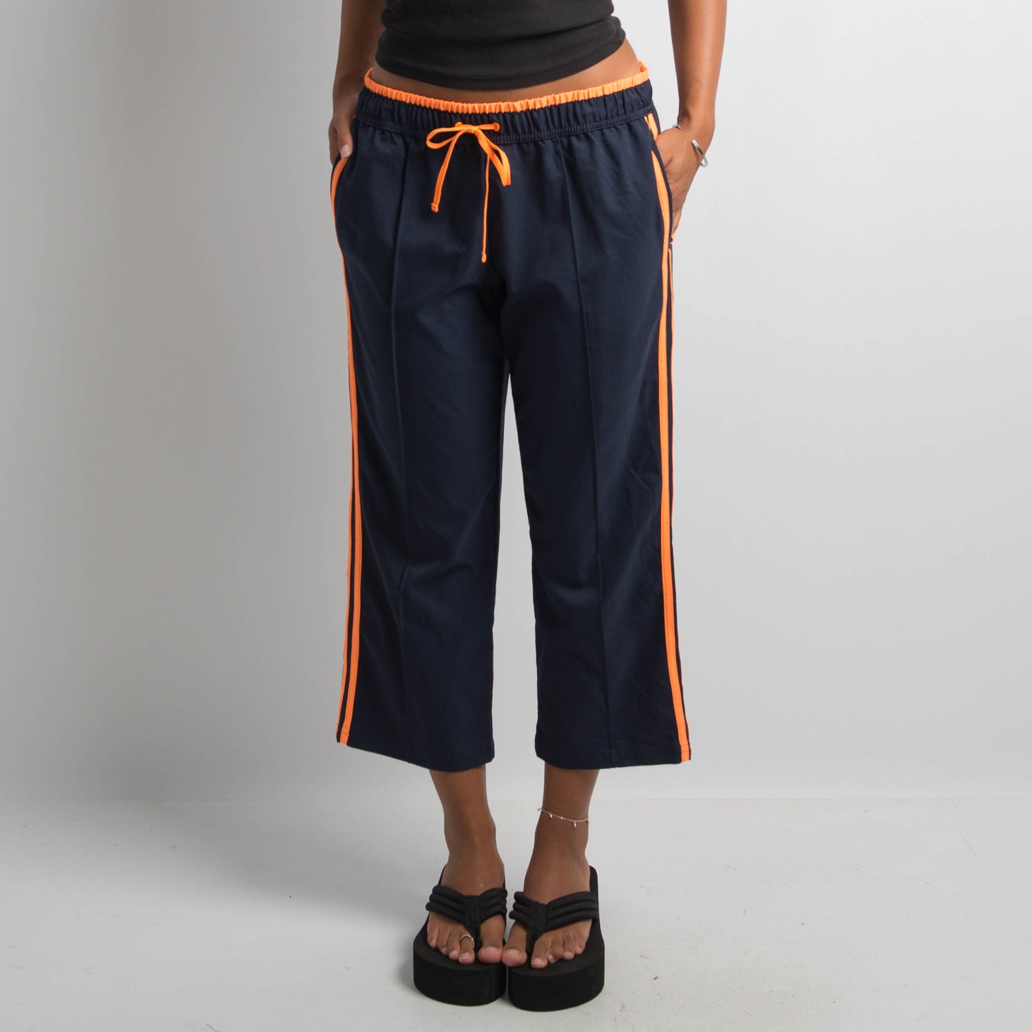 NAVY CROP TRACK PANTS