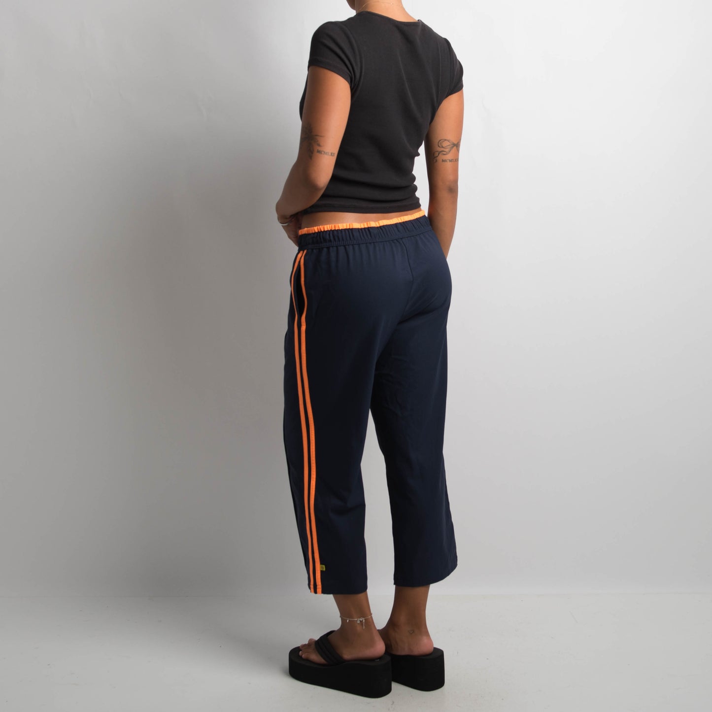 NAVY CROP TRACK PANTS