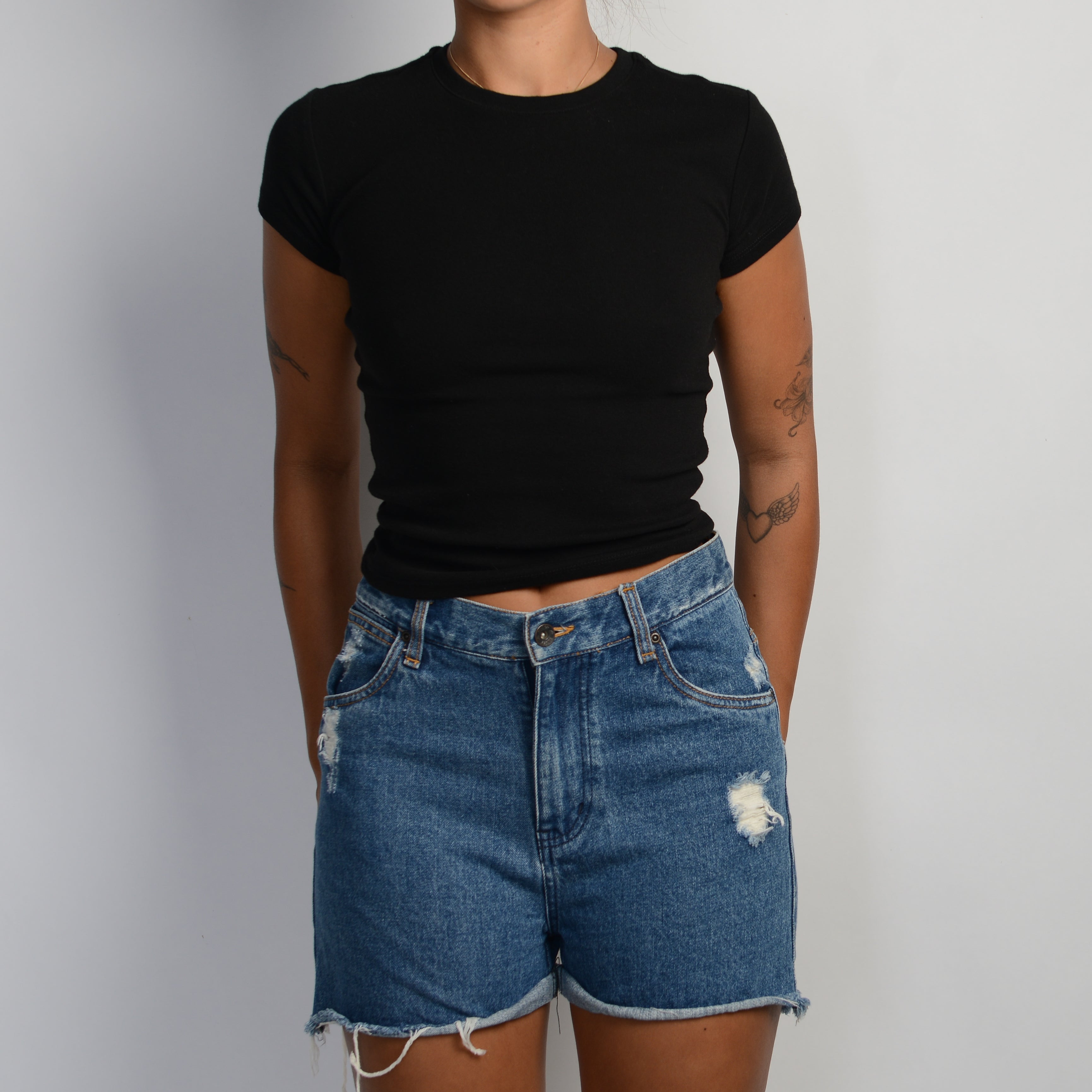 DISTRESSED DENIM SHORTS