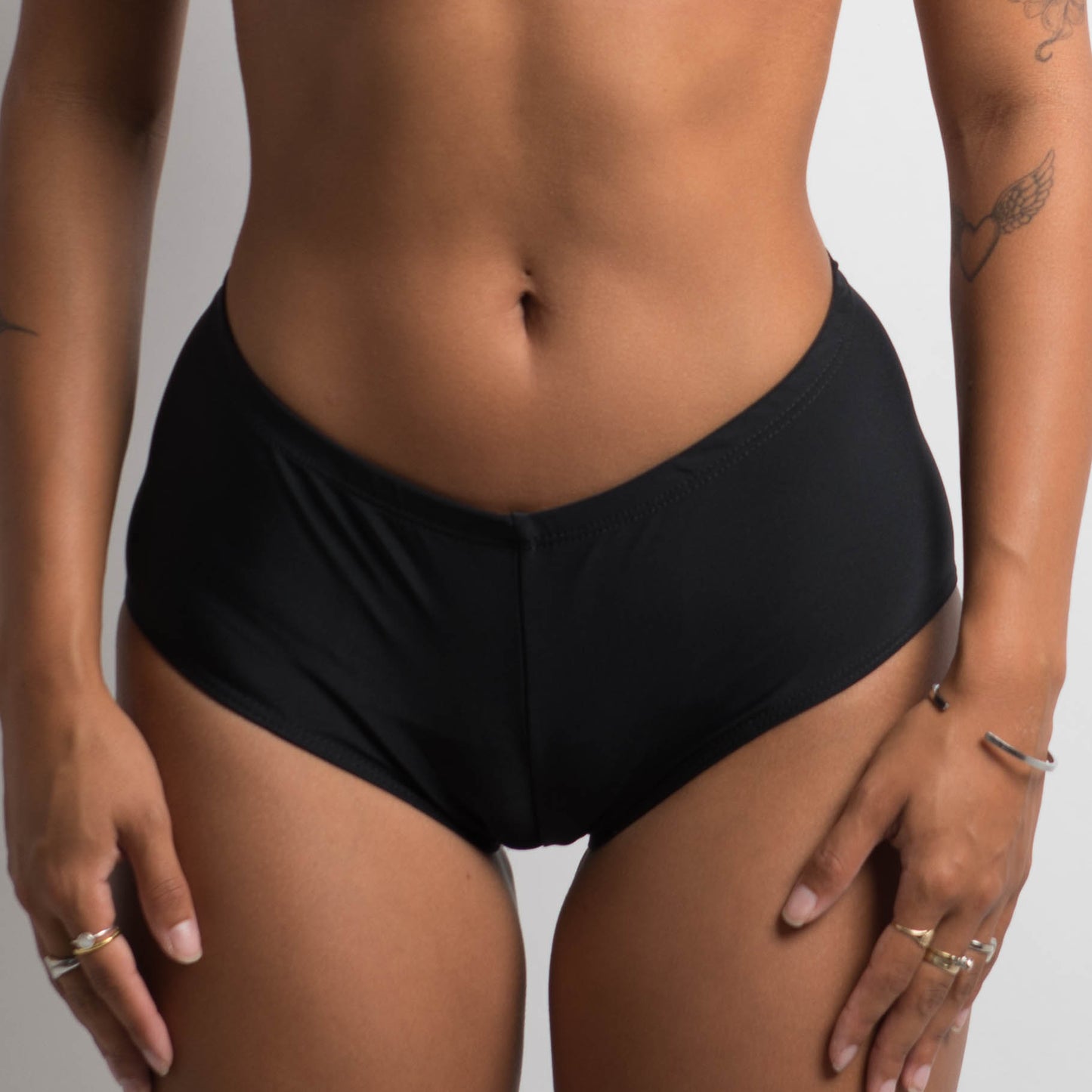 BLACK LOW RISE SWIM SHORTS