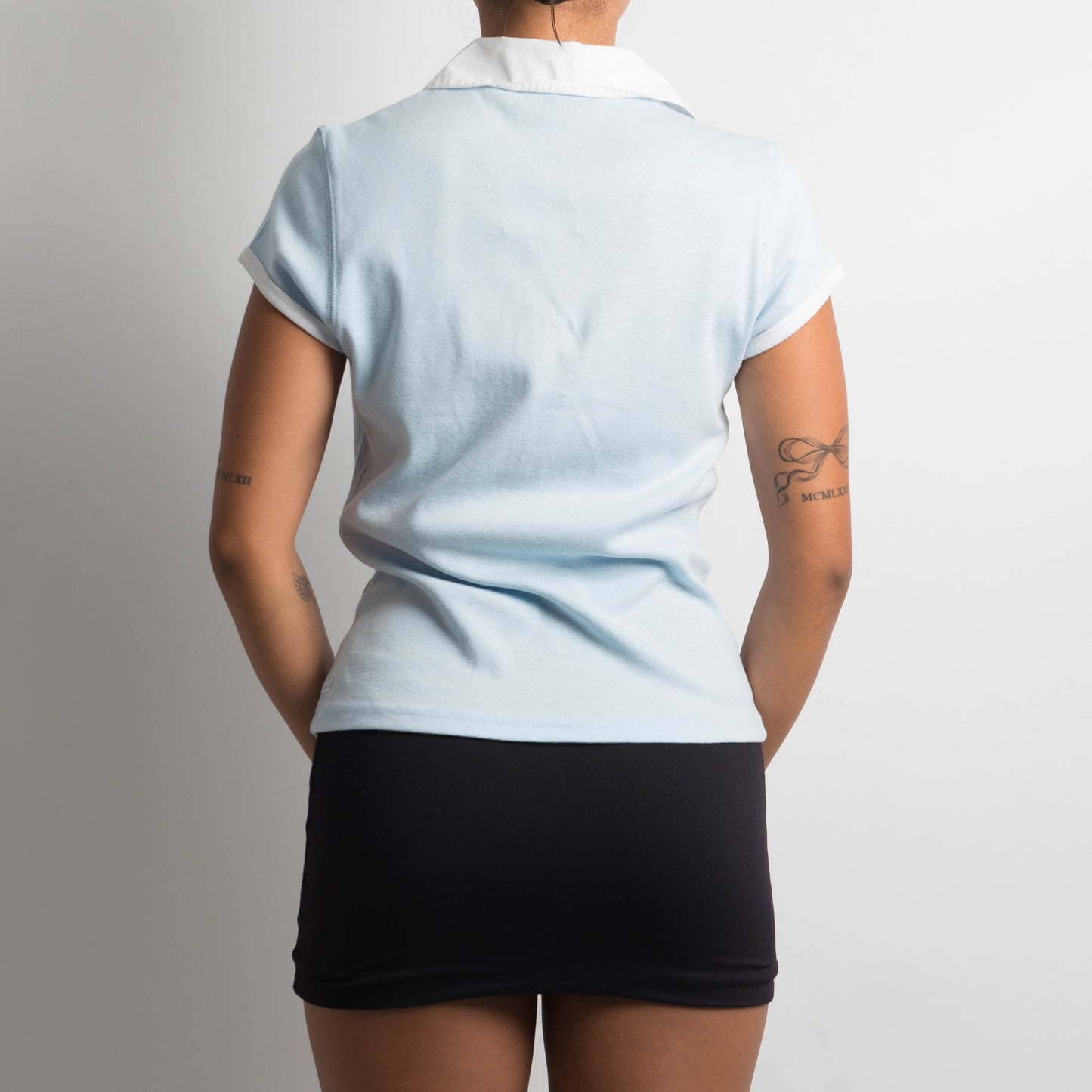 PALE BLUE POLO TOP