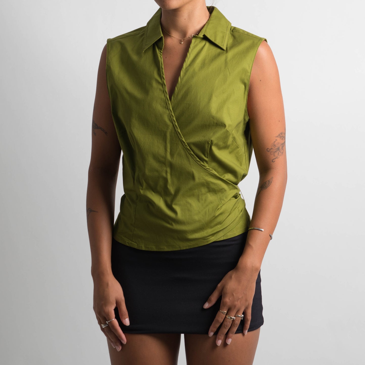 GREEN SLEEVELESS WRAP BLOUSE