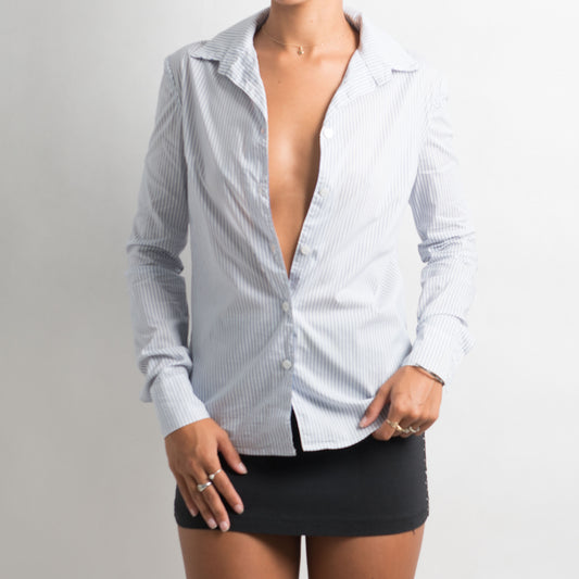 BLOUSE AJUSTÉE À RAYURES BLEUES