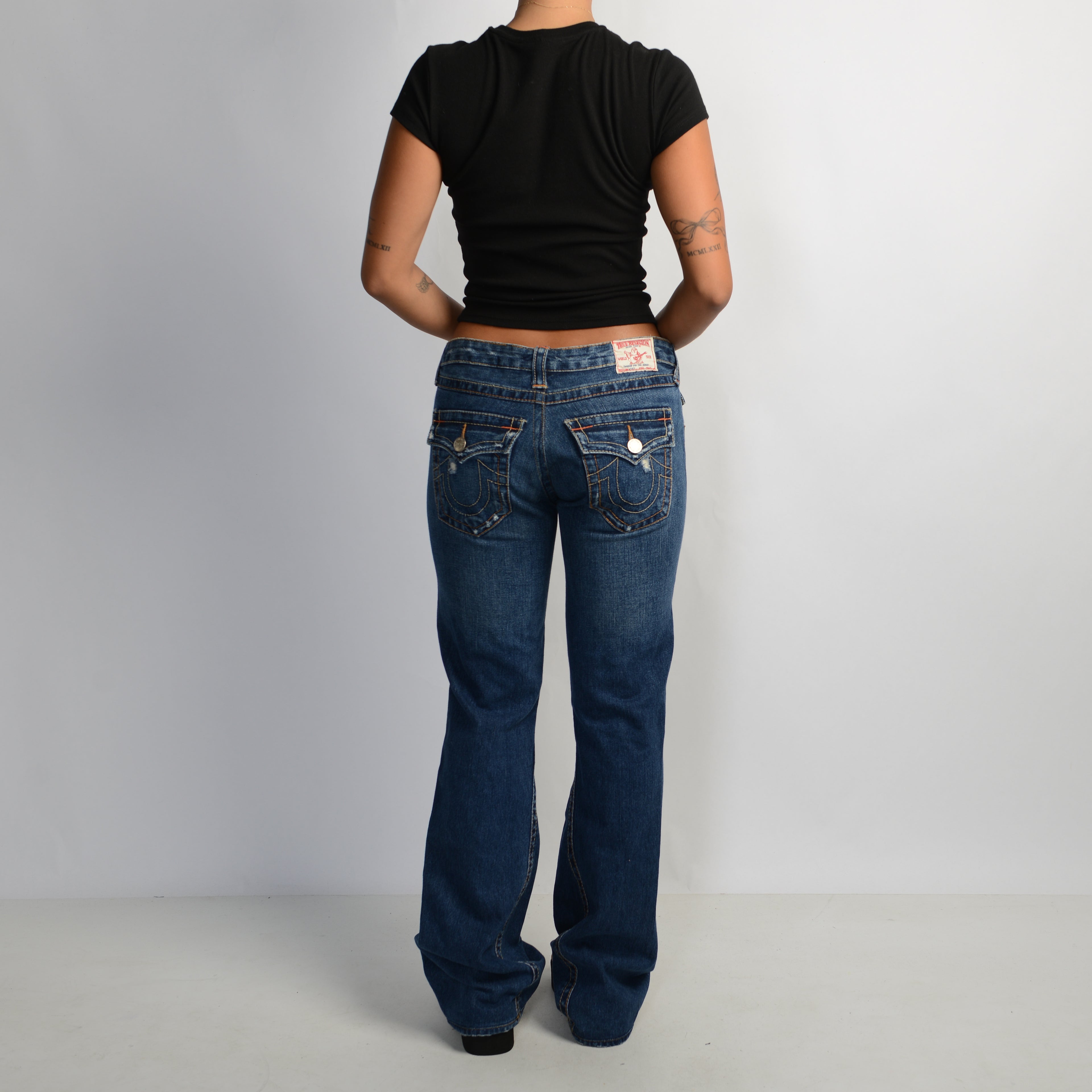 DISTRESSED BOOTCUT JEANS
