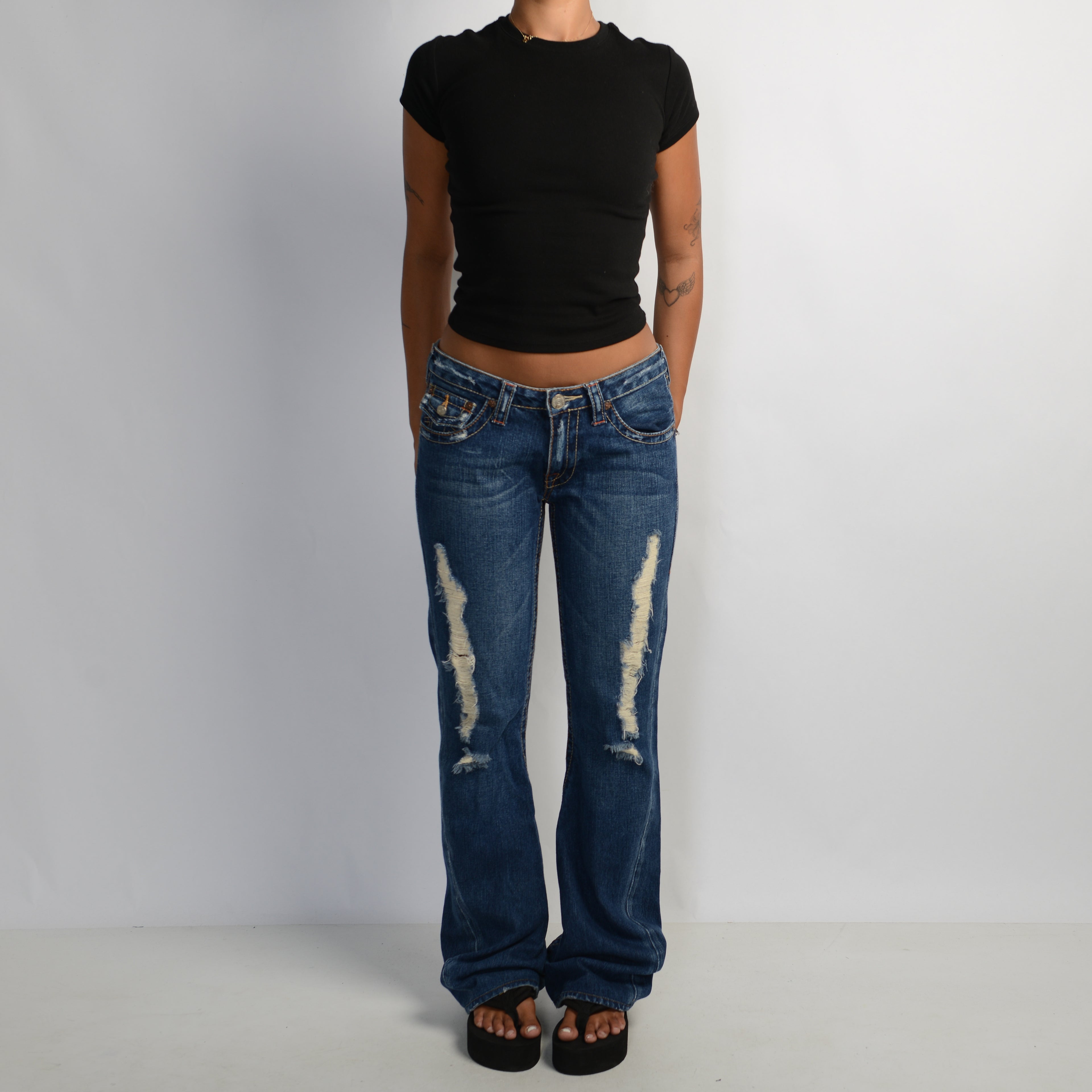 DISTRESSED BOOTCUT JEANS