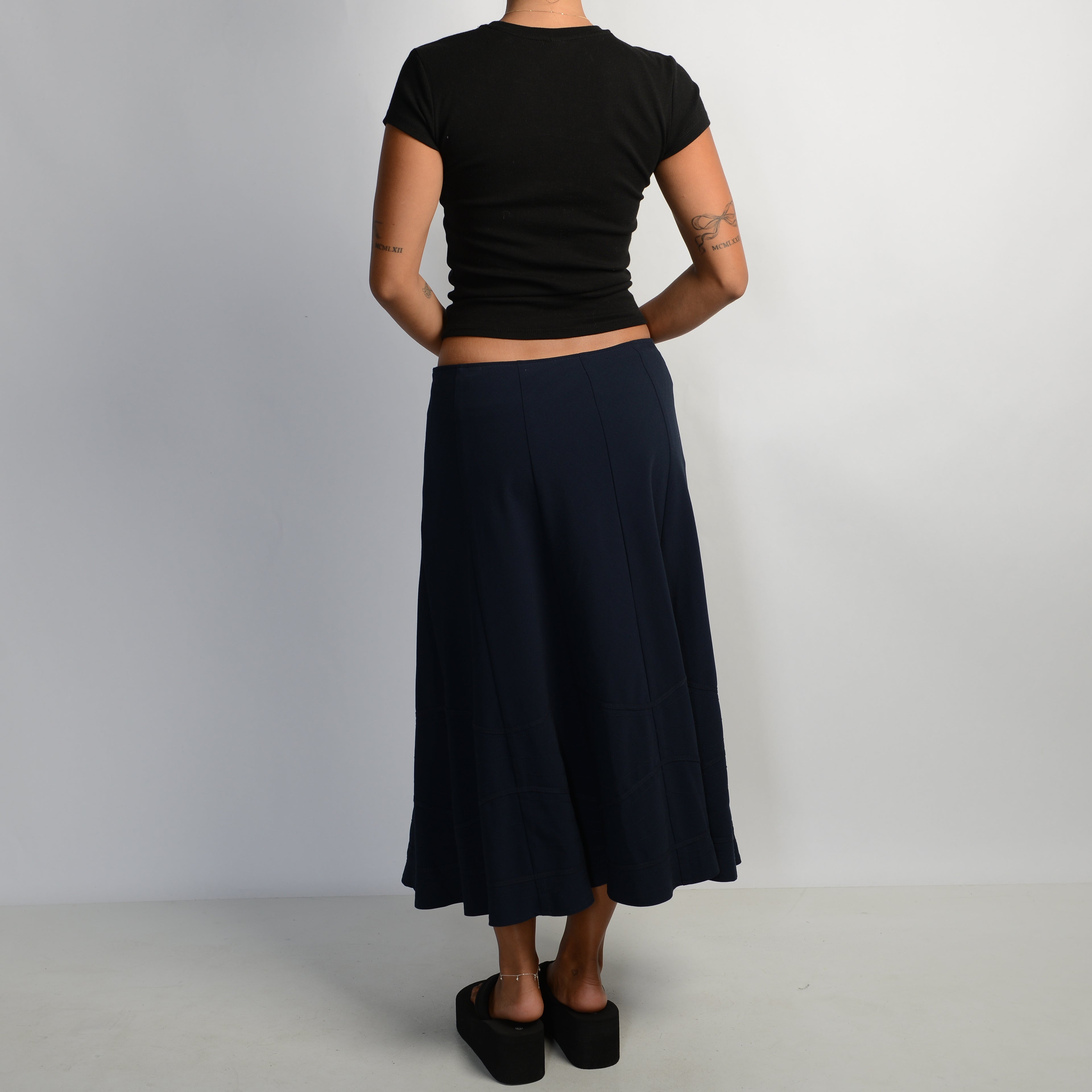 NAVY LONGLINE SKIRT