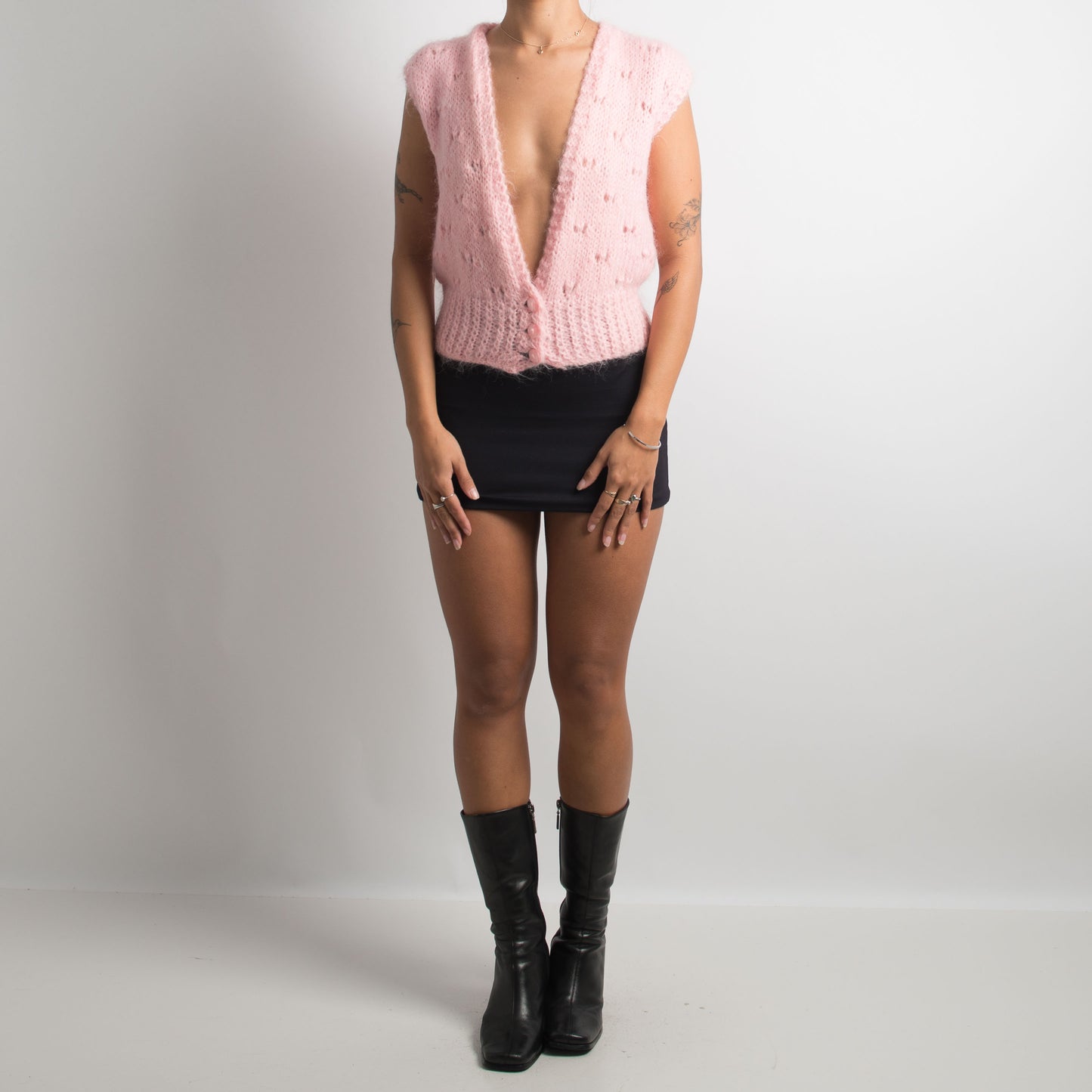 GILET EN TRICOT ROSE