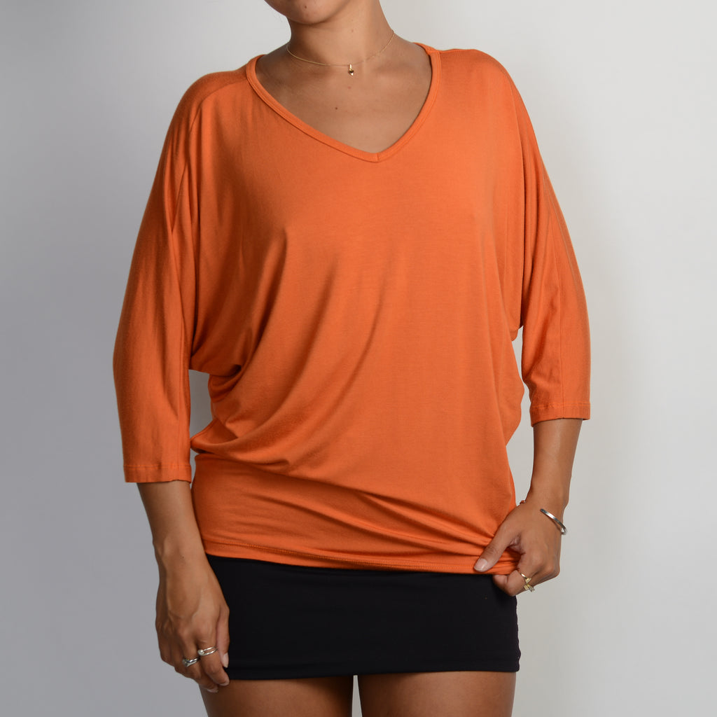 ORANGE BATWING TOP