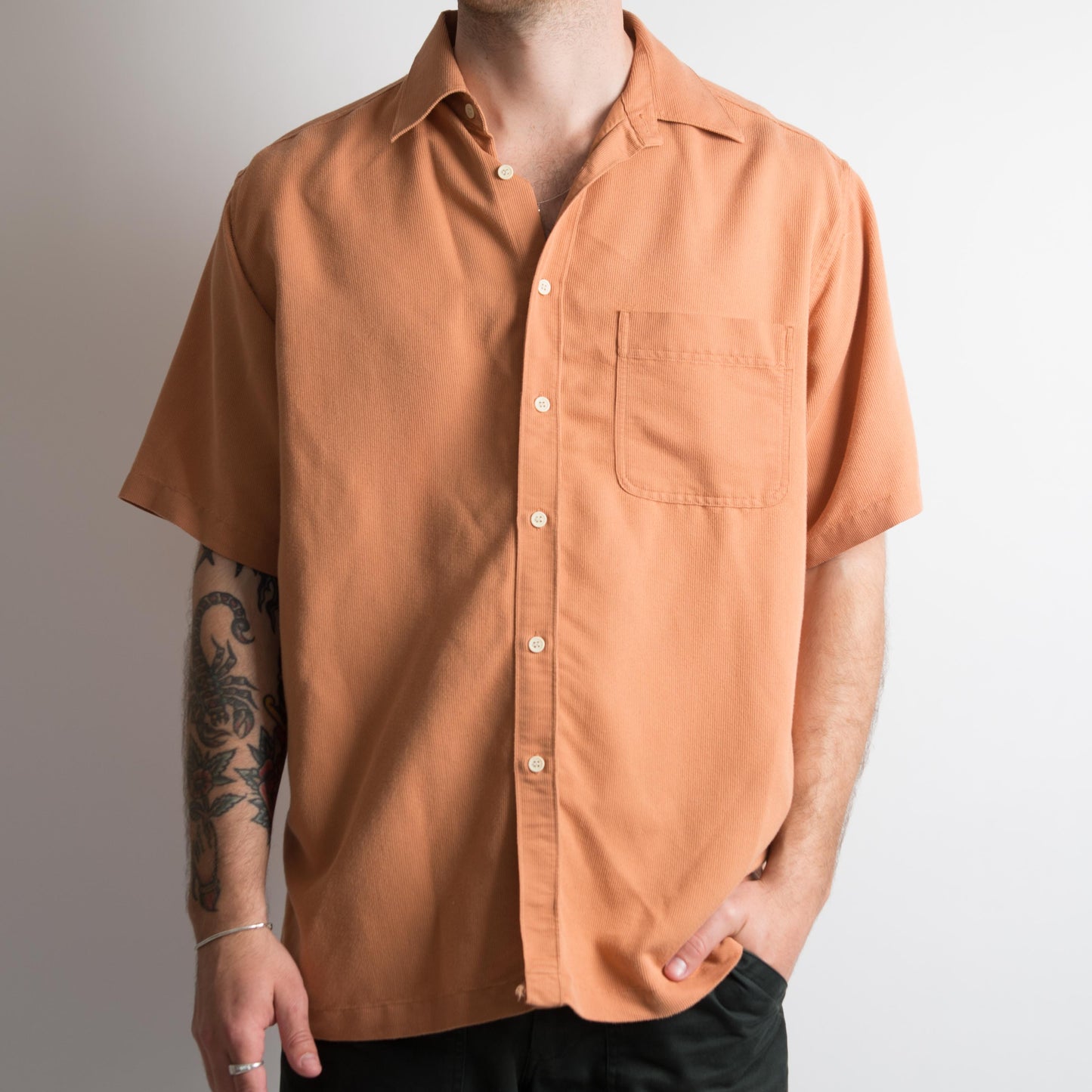 ORANGE BUTTON UP