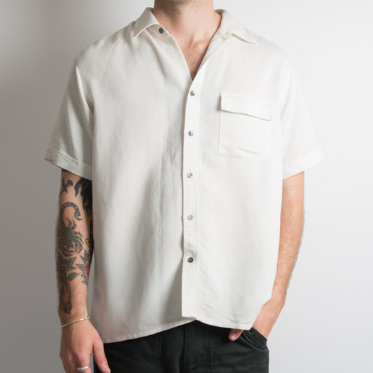 CHEMISE À BOUTONNAGES BLANC CASSÉ