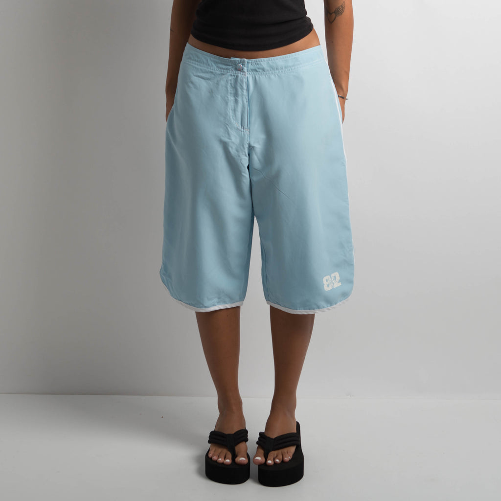 BLUE LONGLINE BOARD SHORTS