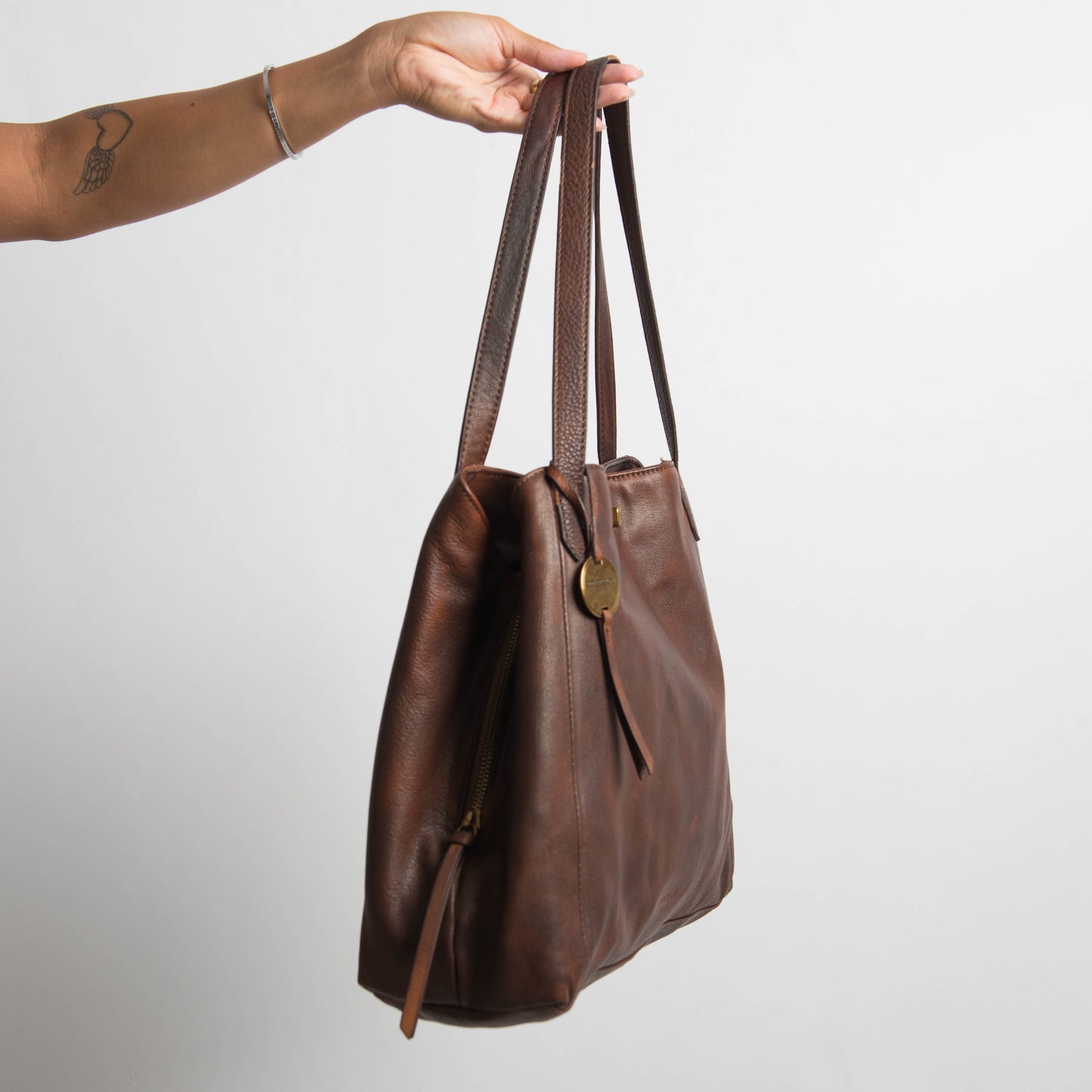 STAINED LEATHER BAG