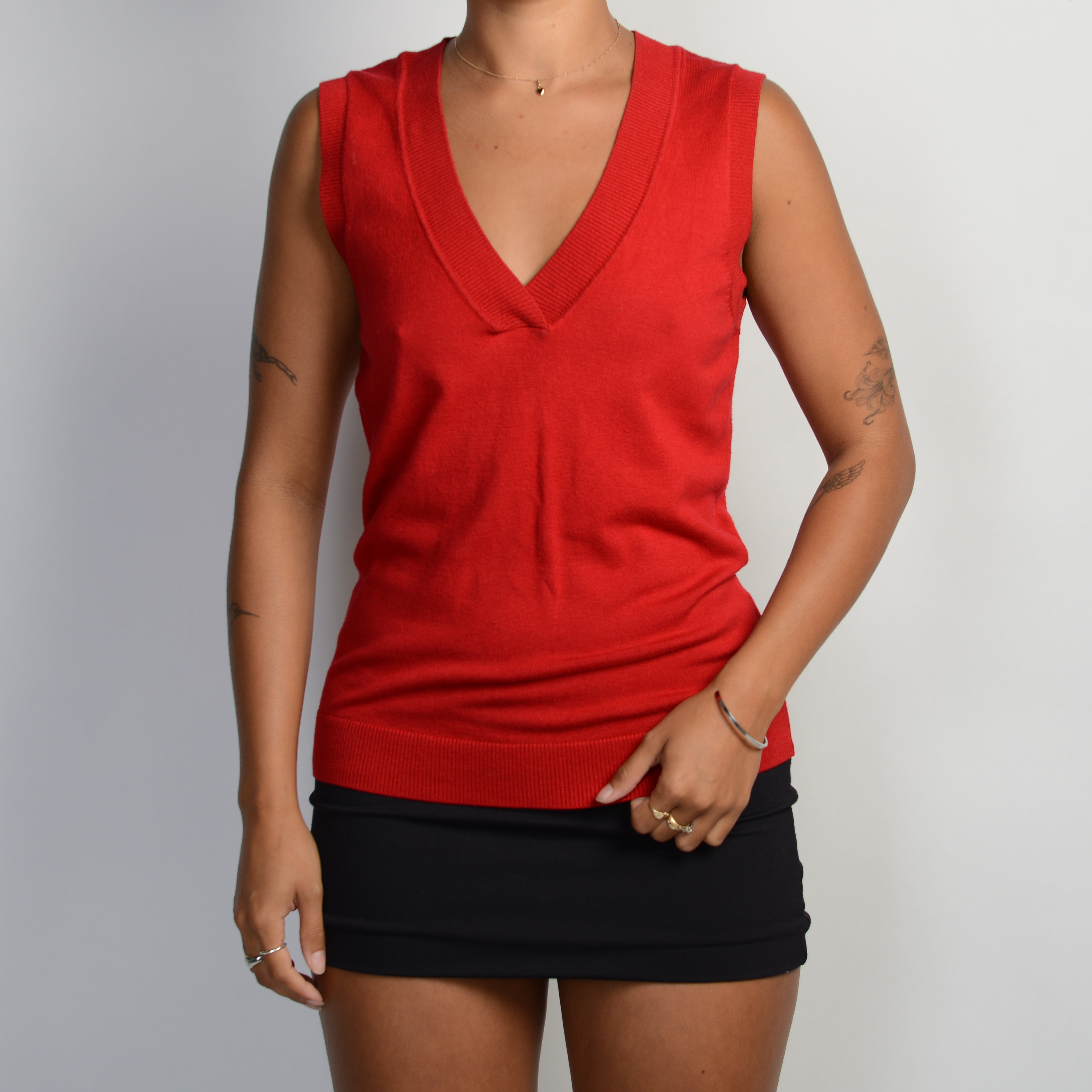 RED SLEEVELESS VEST