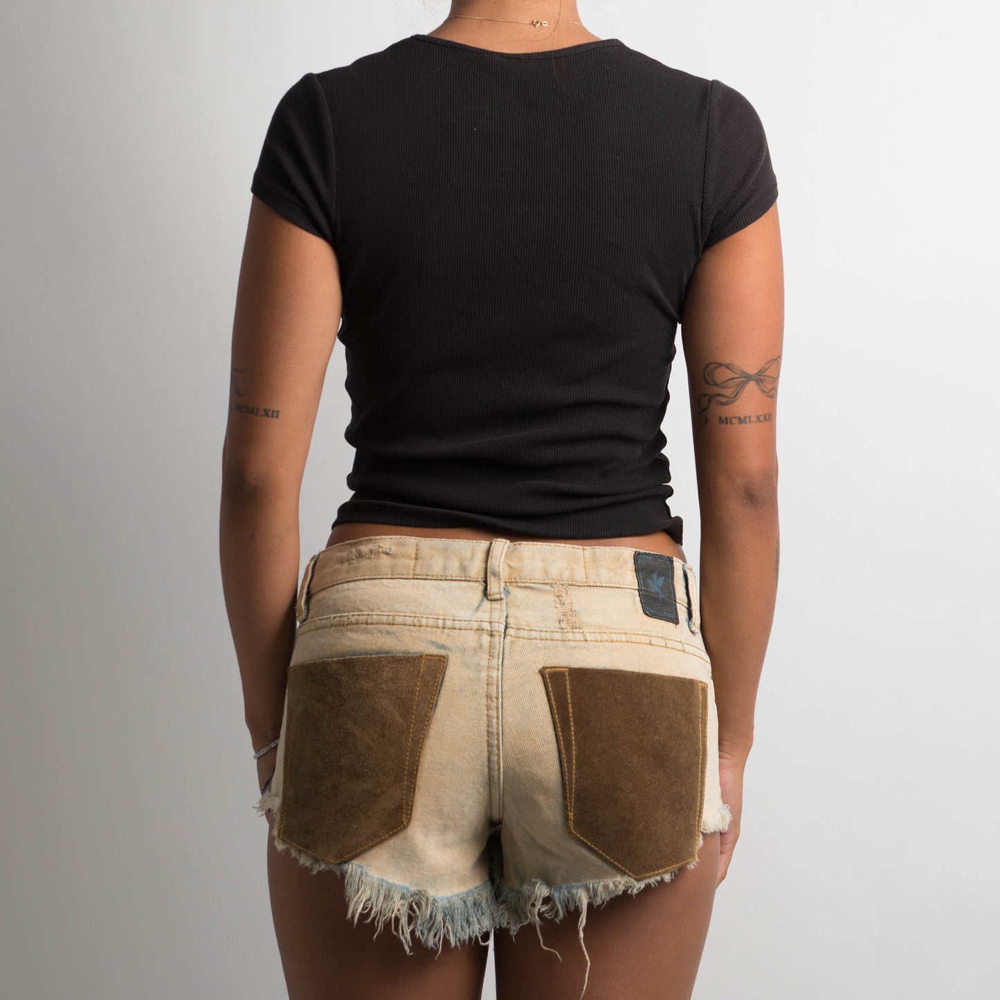 TAN DENIM CUT OFF SHORTS