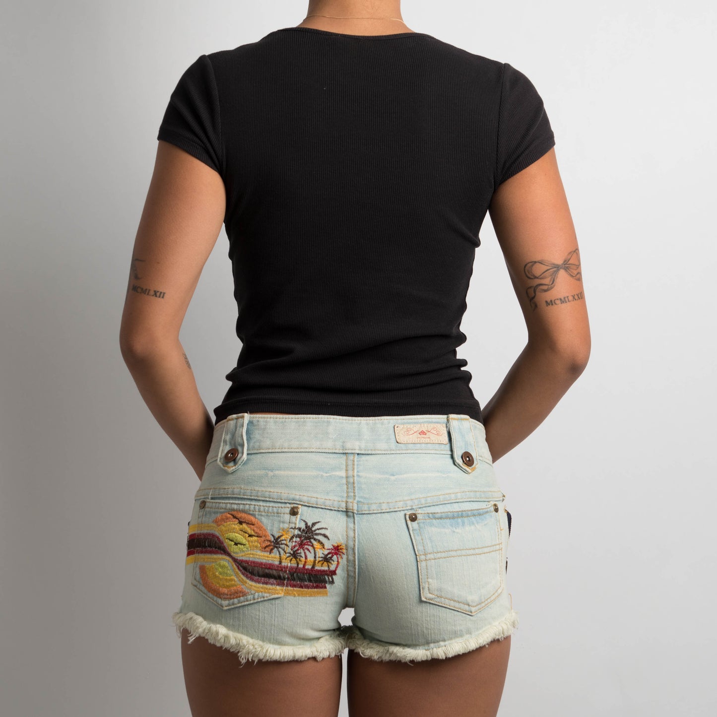 EMBROIDERED DENIM MINI SHORTS