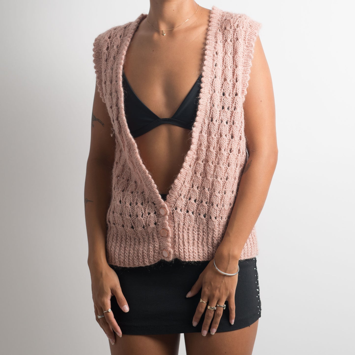 GILET EN TRICOT ROSE