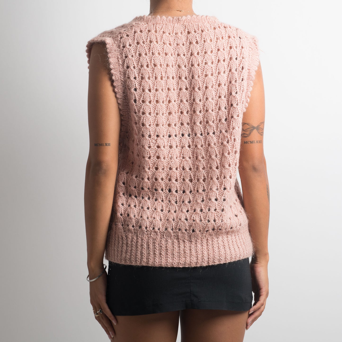 GILET EN TRICOT ROSE