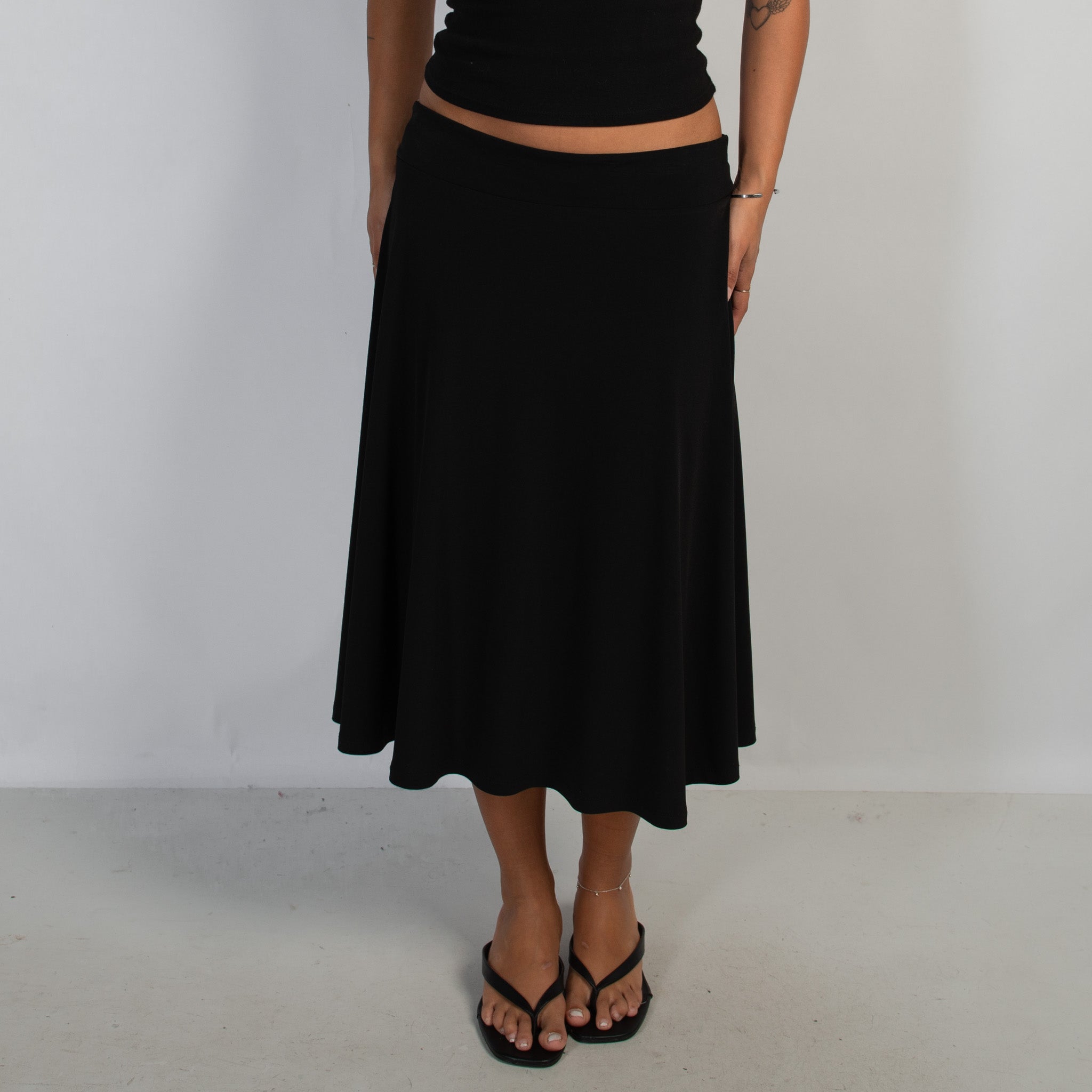 BLACK SLINKY MIDI SKIRT