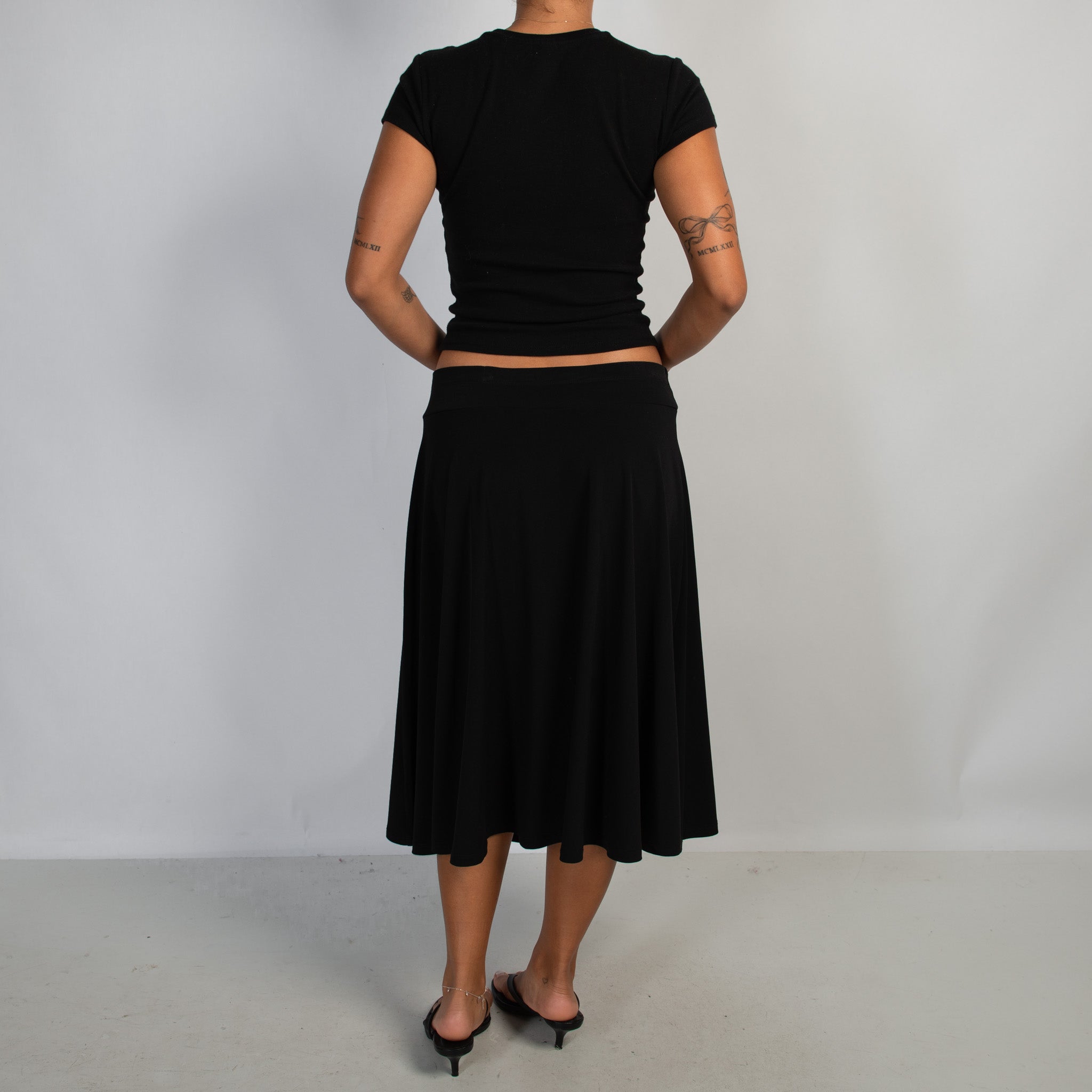 BLACK SLINKY MIDI SKIRT