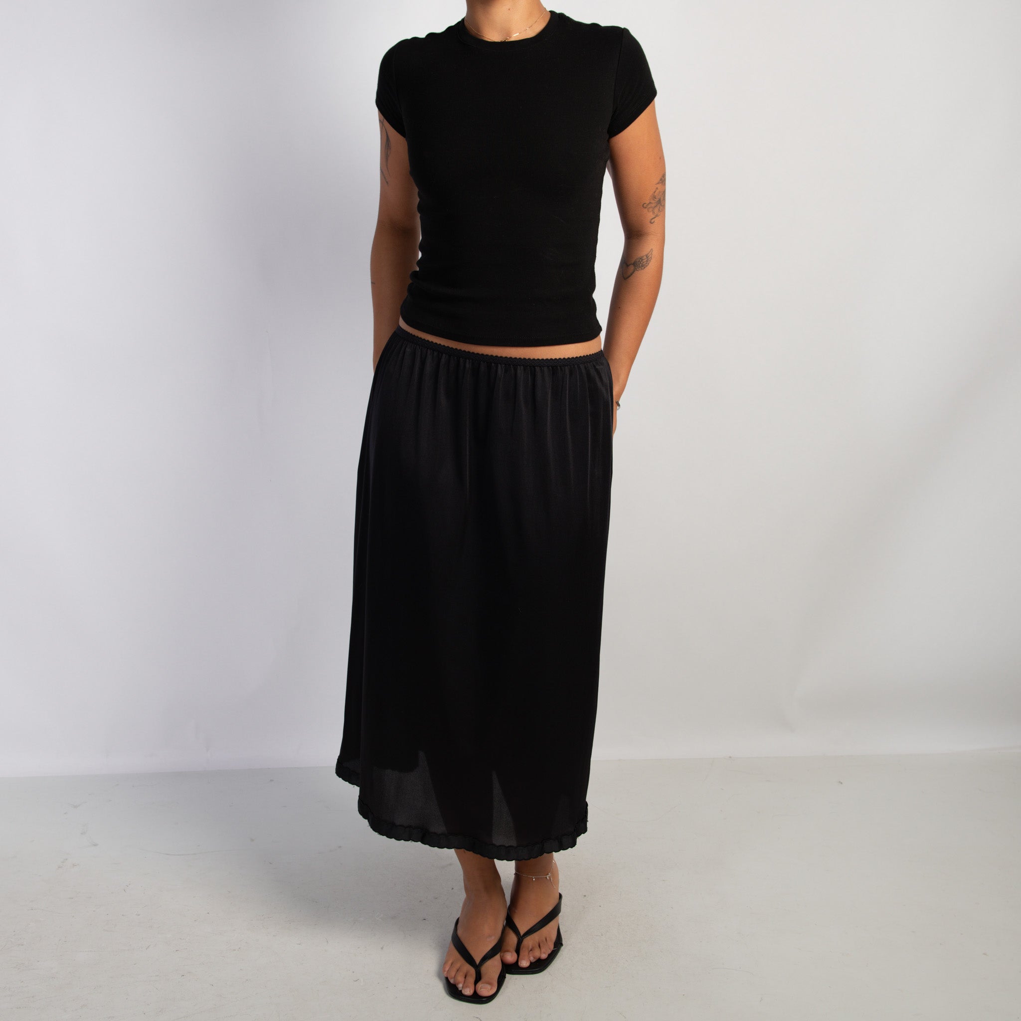 BLACK MIDI SLIP SKIRT