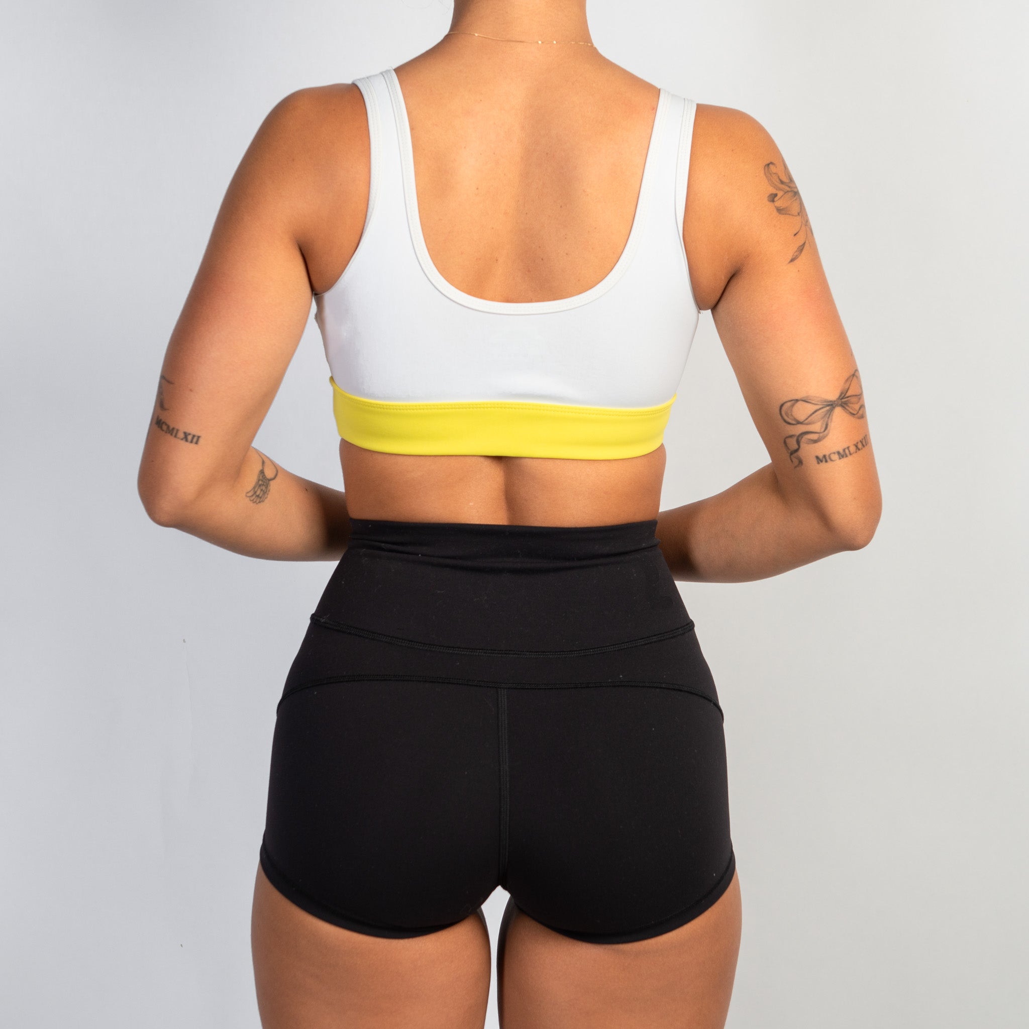 YELLOW PANEL SPORTS BRA