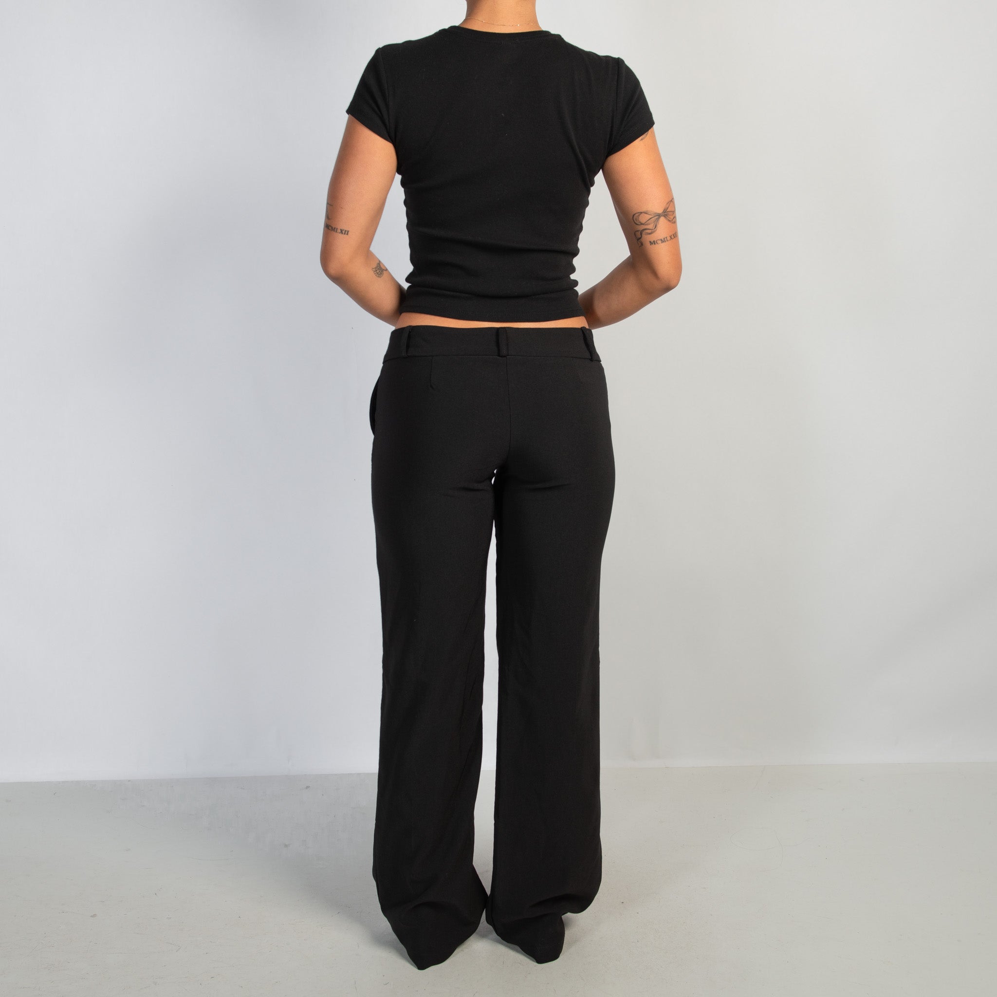 BLACK LOW RISE TROUSERS