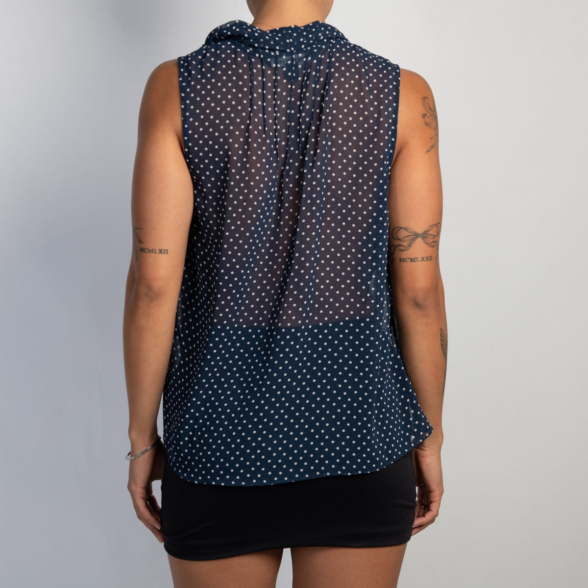 NAVY POLKA DOT BLOUSE