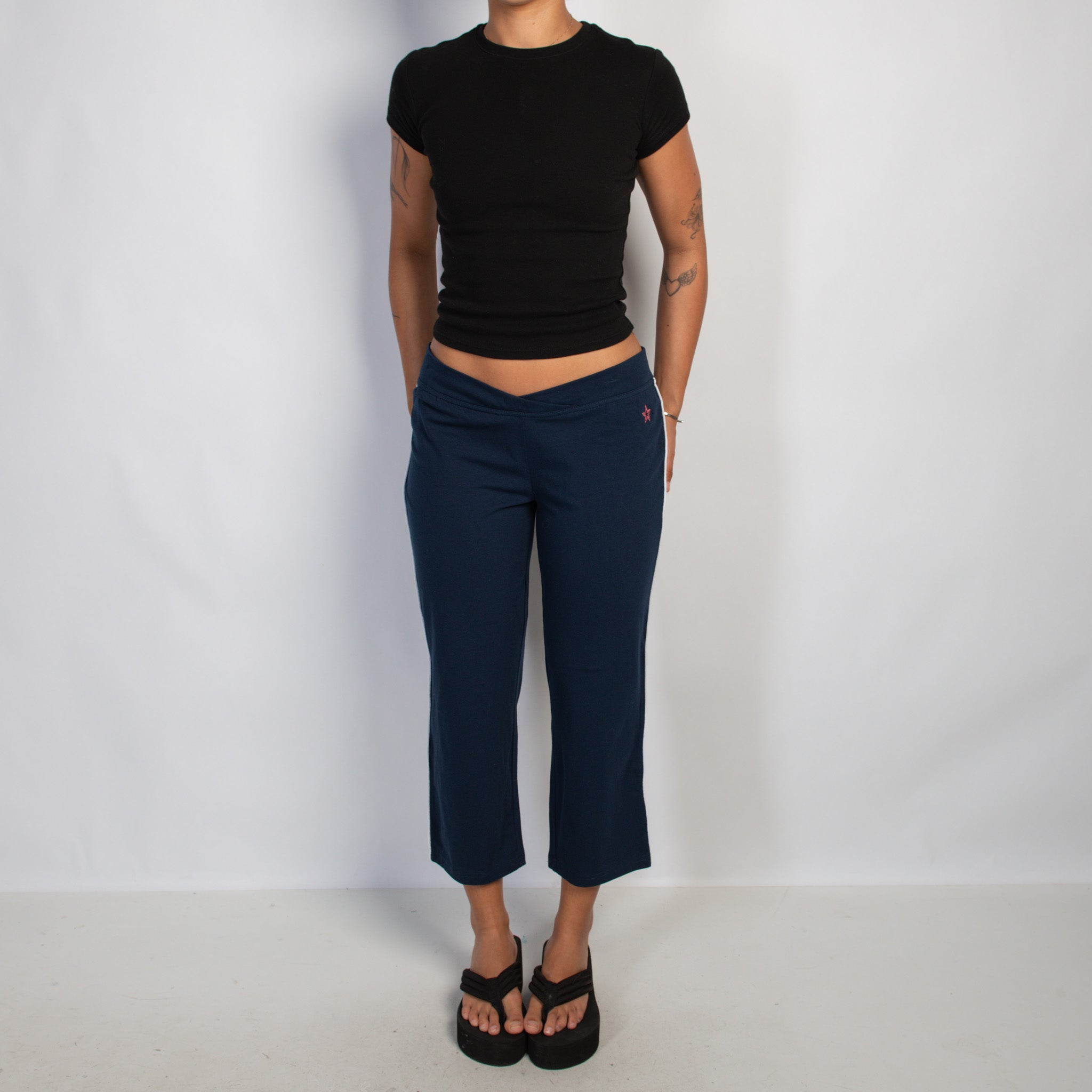 NAVY CROP KICK FLARE PANTS