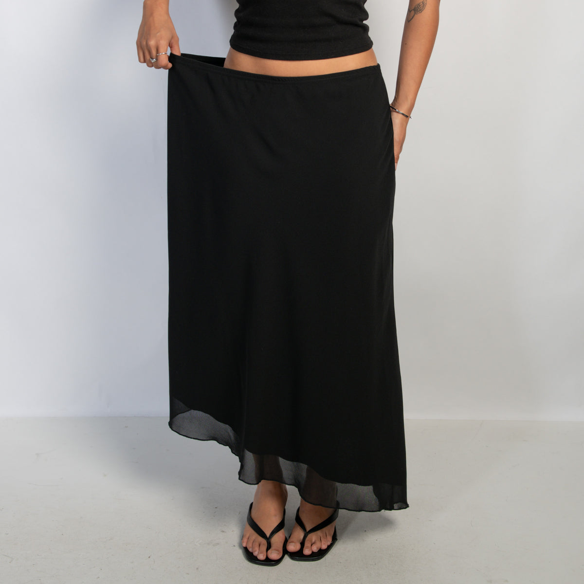 BLACK ASYMMETRIC SKIRT