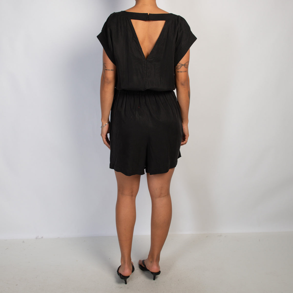BLACK CROSS OVER JUMPSUIT