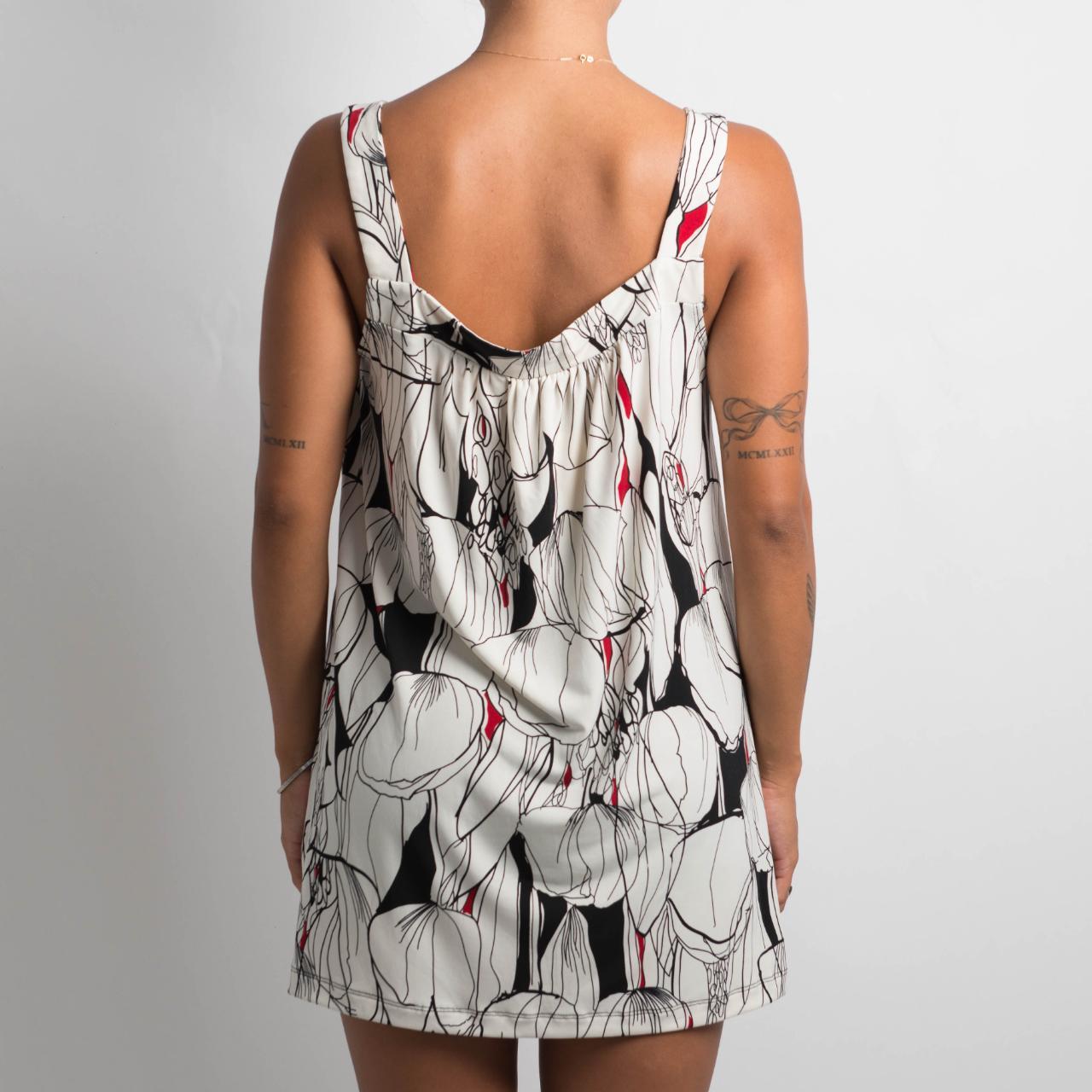 PATTERNED LONGLINE TOP