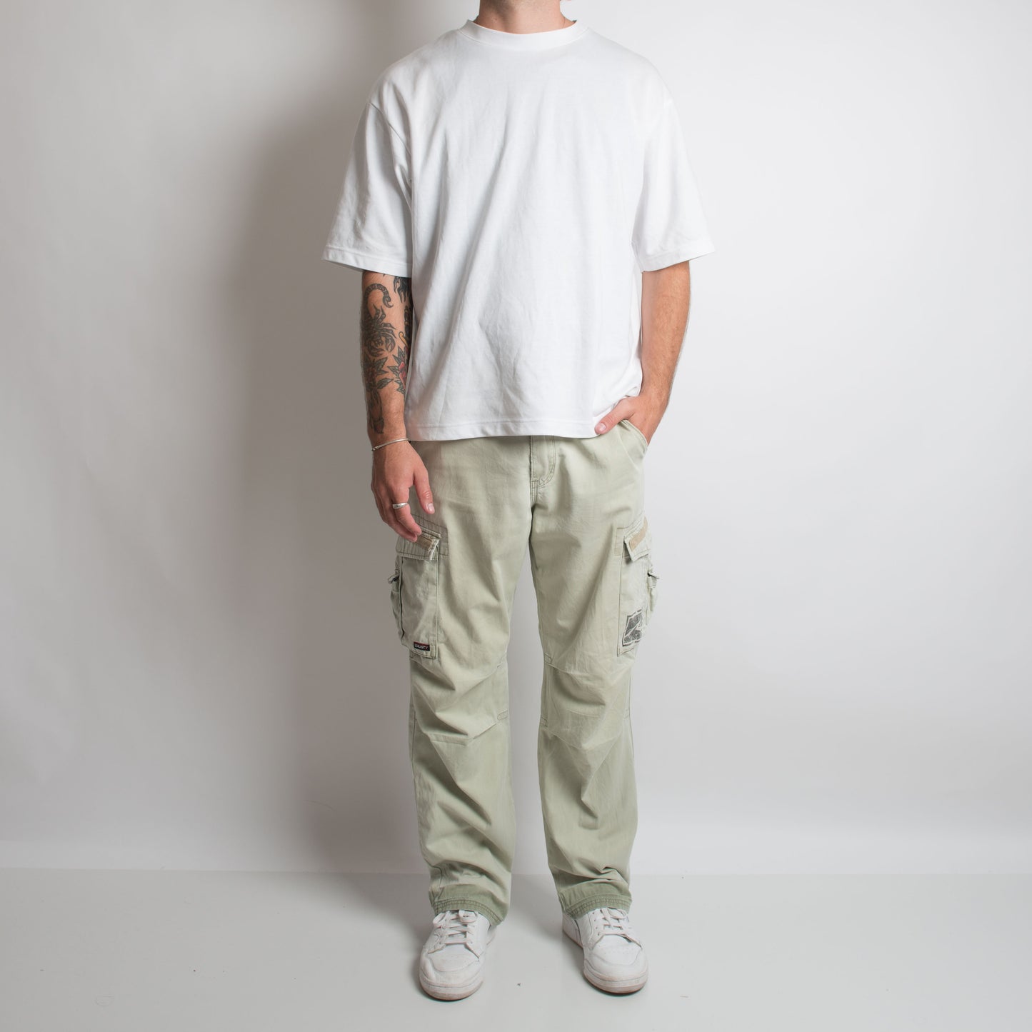 PALE GREEN CARGO TROUSERS