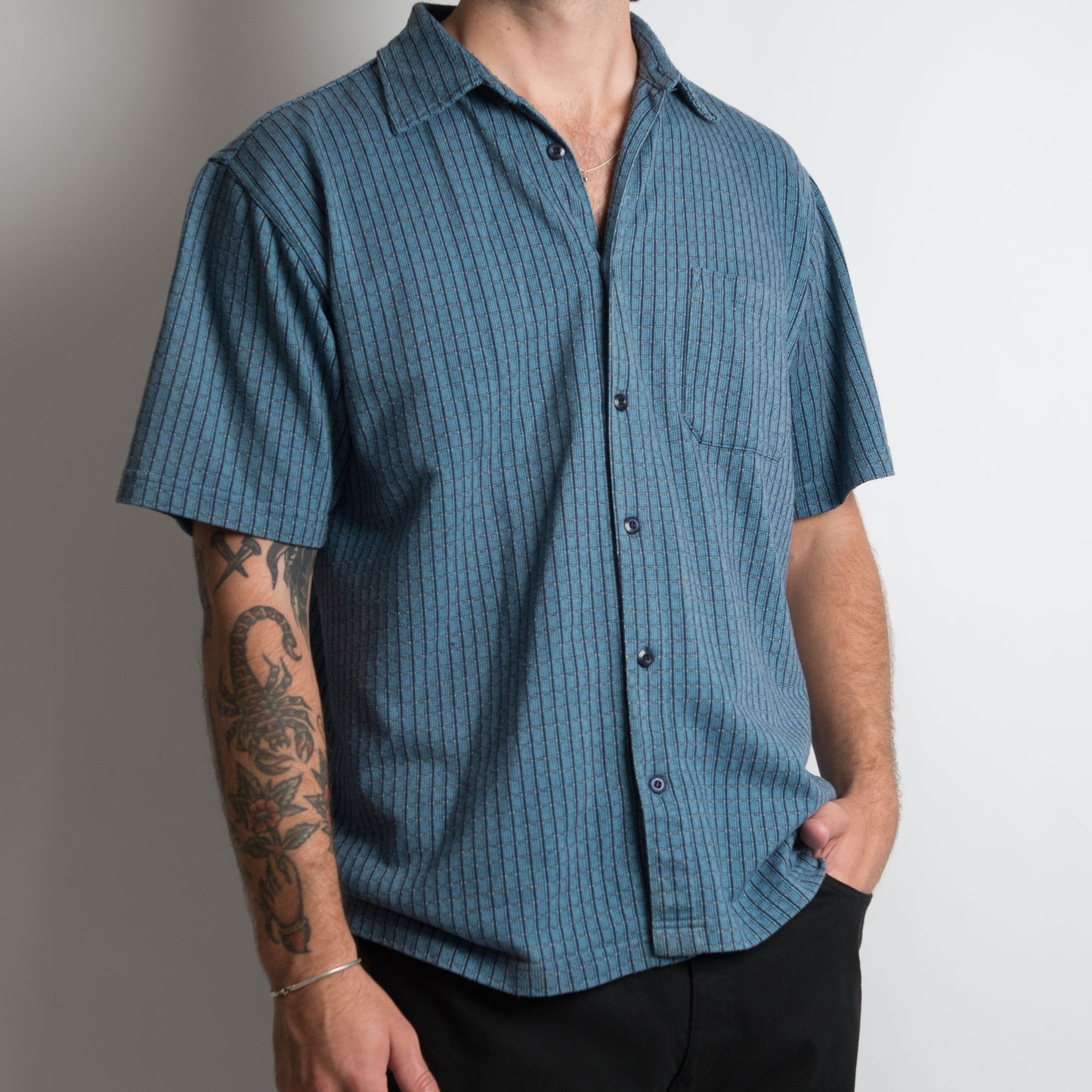 CHEMISE À BOUTONNAGES À CARREAUX BLEU